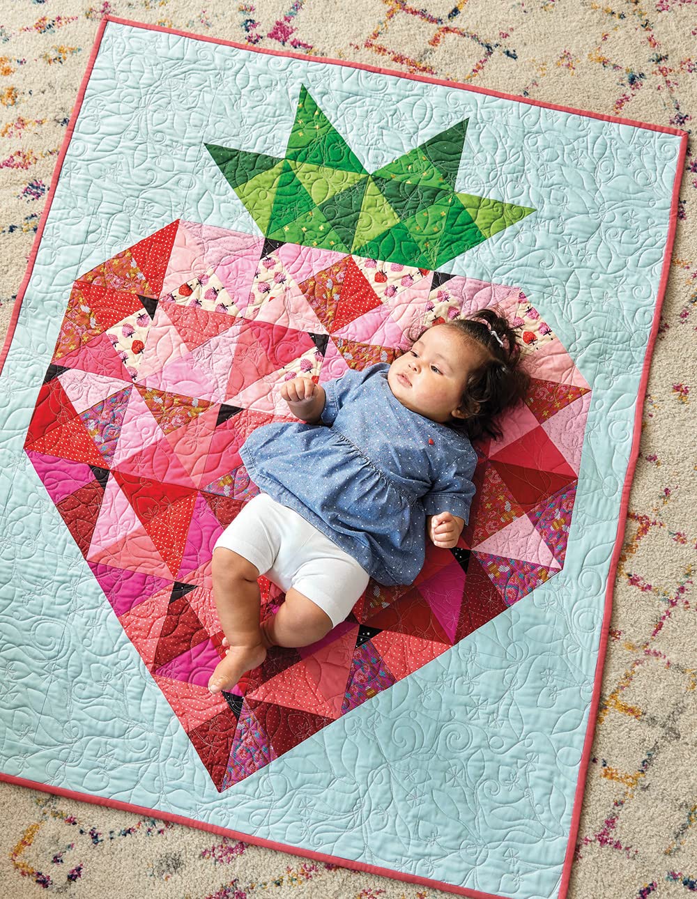 Red and pink strawberry quilt