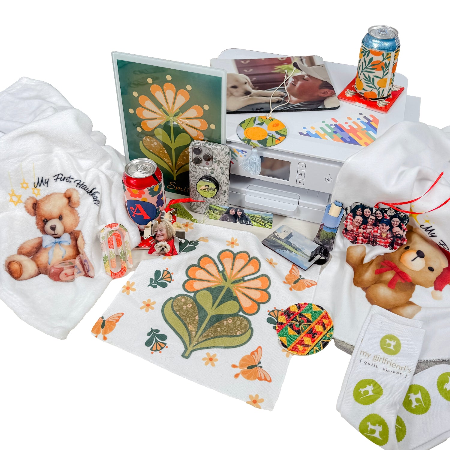 Collection of printed materials with teddy bears and floral designs on a white background made by Artspira Powered Sublimation Printer