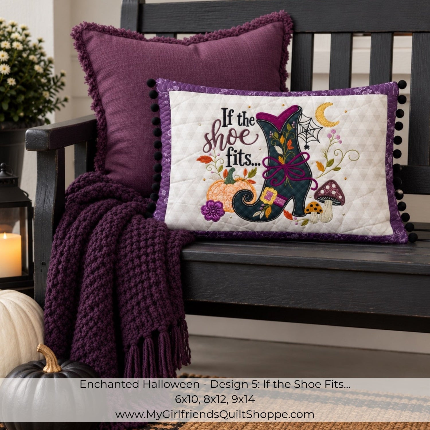 A decorative square throw pillow displayed on a dark wooden bench, styled with a matching purple pillow and a chunky knit purple throw blanket. The front pillow features a white center with a colorful embroidered design of an enchanted shoe, pumpkins, a spiderweb, and the text 'If the shoe fits.