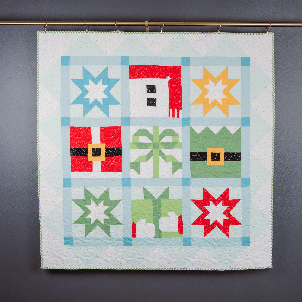 Colorful holiday quilt with geometric patterns