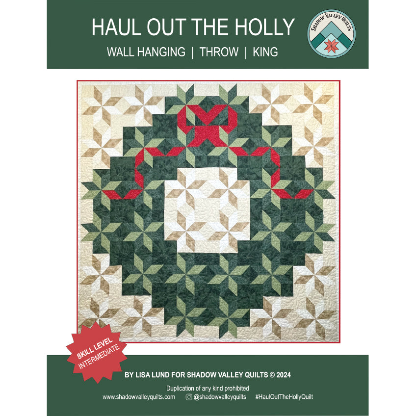 Pattern cover for 'Haul Out the Holly' wall hanging quilt by Lisa Lund for Shadow Valley Quilts, showing a green and beige geometric wreath design with a red bow and ribbon on a white background.