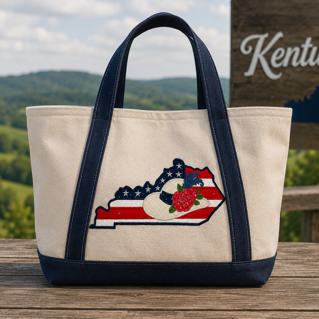 Tote bag with Kentucky design on a wooden surface with a scenic background