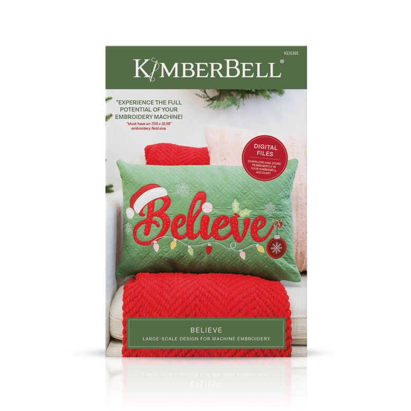 KimmerBell Believe Christmas pillow embroidery design package, featuring a green pillow with red 'Believe' lettering and holiday accents, set against a white background with a reflection.