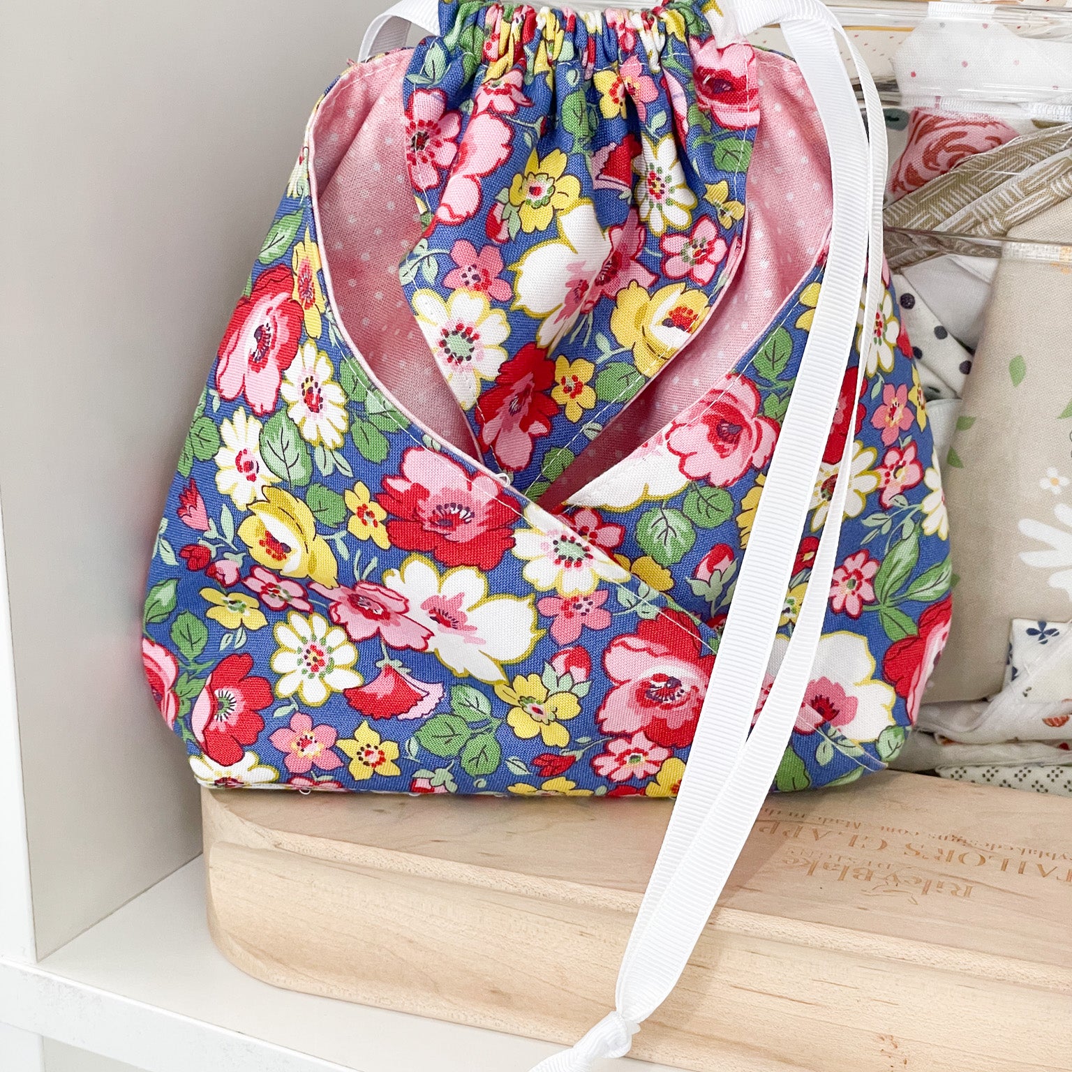 Origami Bag - Pink version with pink fabric with dots and a blue floral print