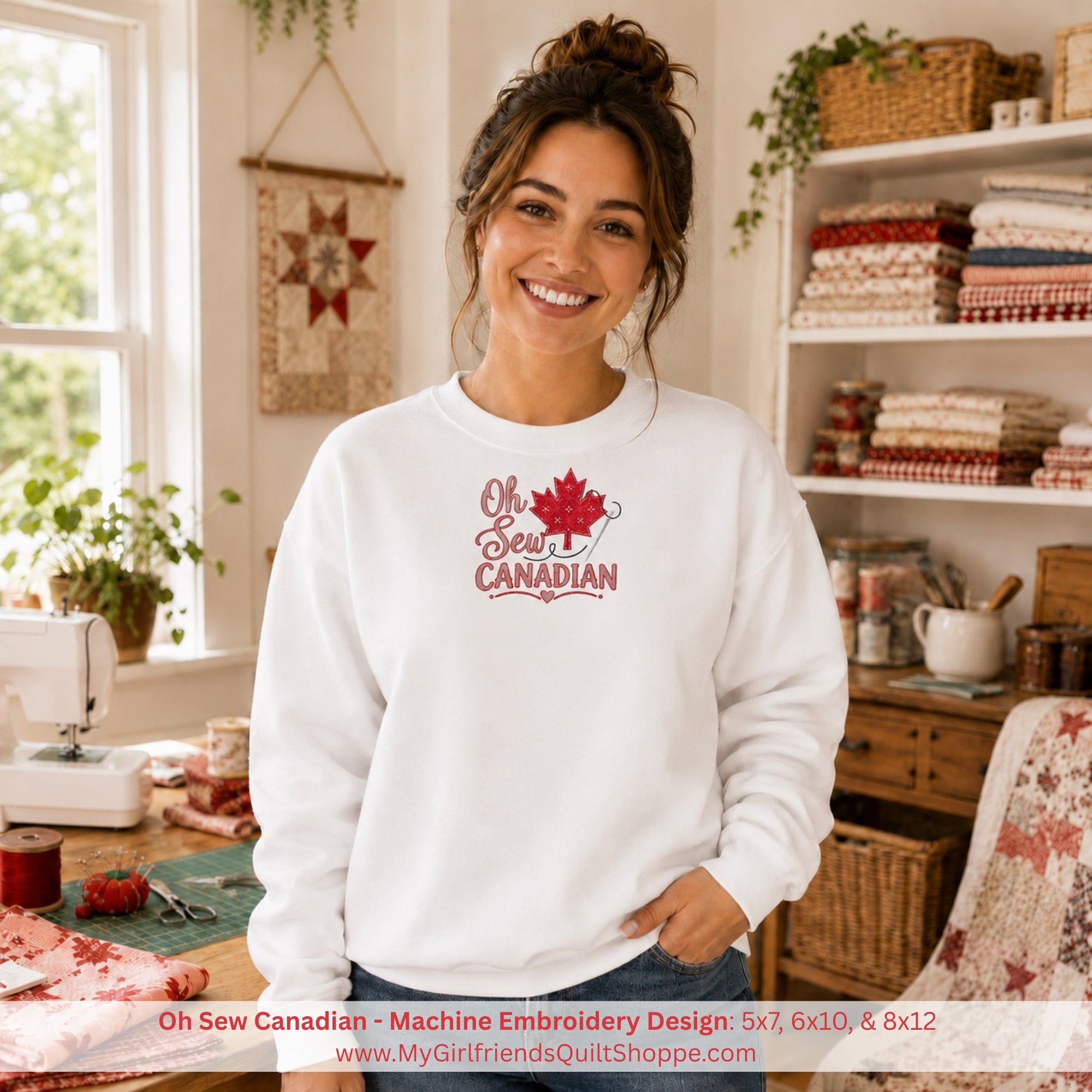 Woman wearing a white sweatshirt with 'Oh Sew Canadian' design in a sewing room.