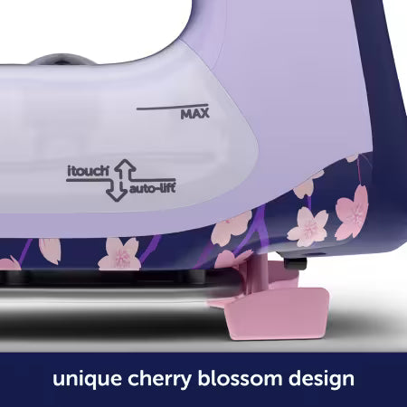 Purple and pink iron with cherry blossom design on a white background