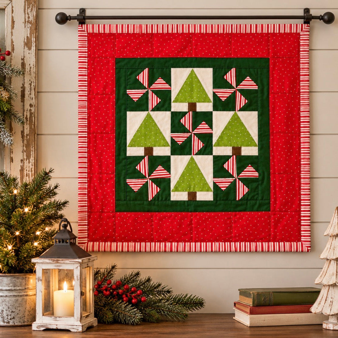 A festive Christmas quilted wall hanging displayed on a black rod against a beige wood-paneled wall. The quilt features a red outer border, a dark green inner field, and green tree and striped pinwheel motifs.