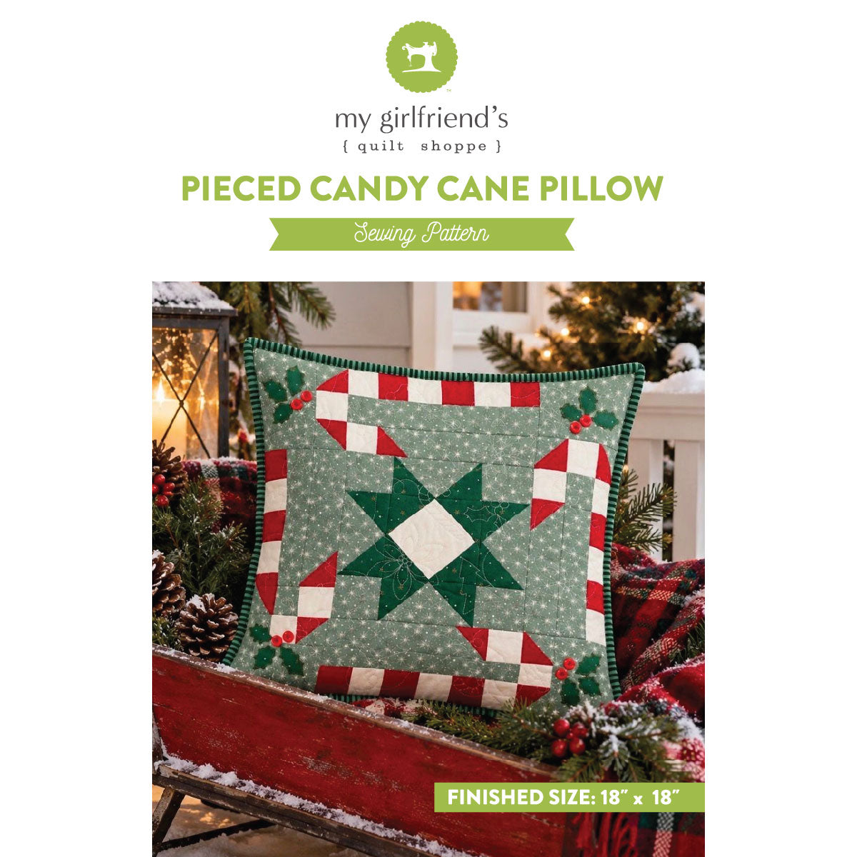Sewing pattern cover for a 'Pieced Candy Cane Pillow' by my girlfriend's { quilt shoppe }, showing a finished 18" x 18" quilted pillow with a green, red, and white holiday design.