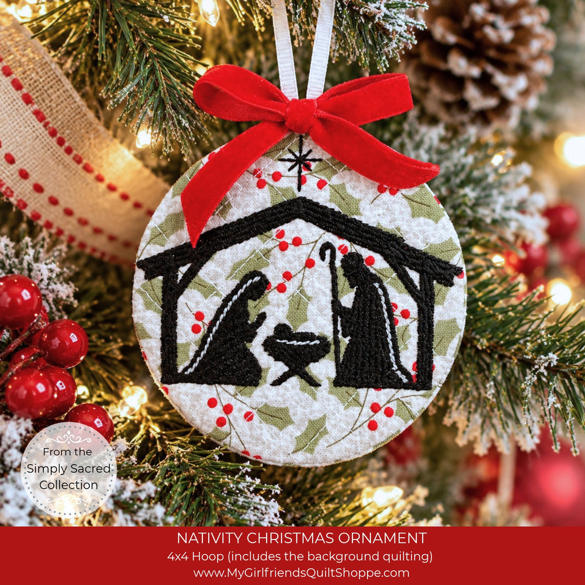 A round embroidered Christmas ornament hanging on a decorated tree. The ornament has a white background with a green holly pattern, black silhouette figures in a stable scene, a red fabric bow at the top, and a white hanging loop.