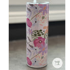 Tumbler with floral design on a neutral background