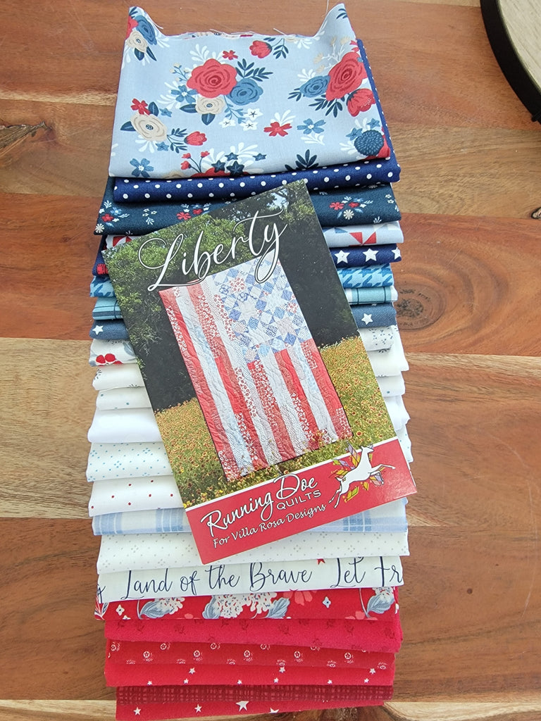 Patriotic fabrics for a flag-themed quilt. 