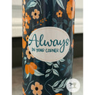 Tumbler with floral design and 'Always In Your Corner' text on a dark background