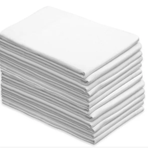 Stack of white folded towels on a white background
