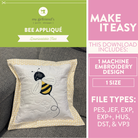 Quilted pillow with bee appliqué design on a gray couch, with text about downloadable files for machine embroidery.