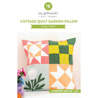 Cottage quilt garden pillow with colorful pattern on a white background, featuring 'my girlfriend's quilt shoppe' branding.