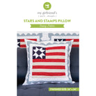Stars and Stamps Pillow sewing pattern packaging with a pillow design on a gray couch.