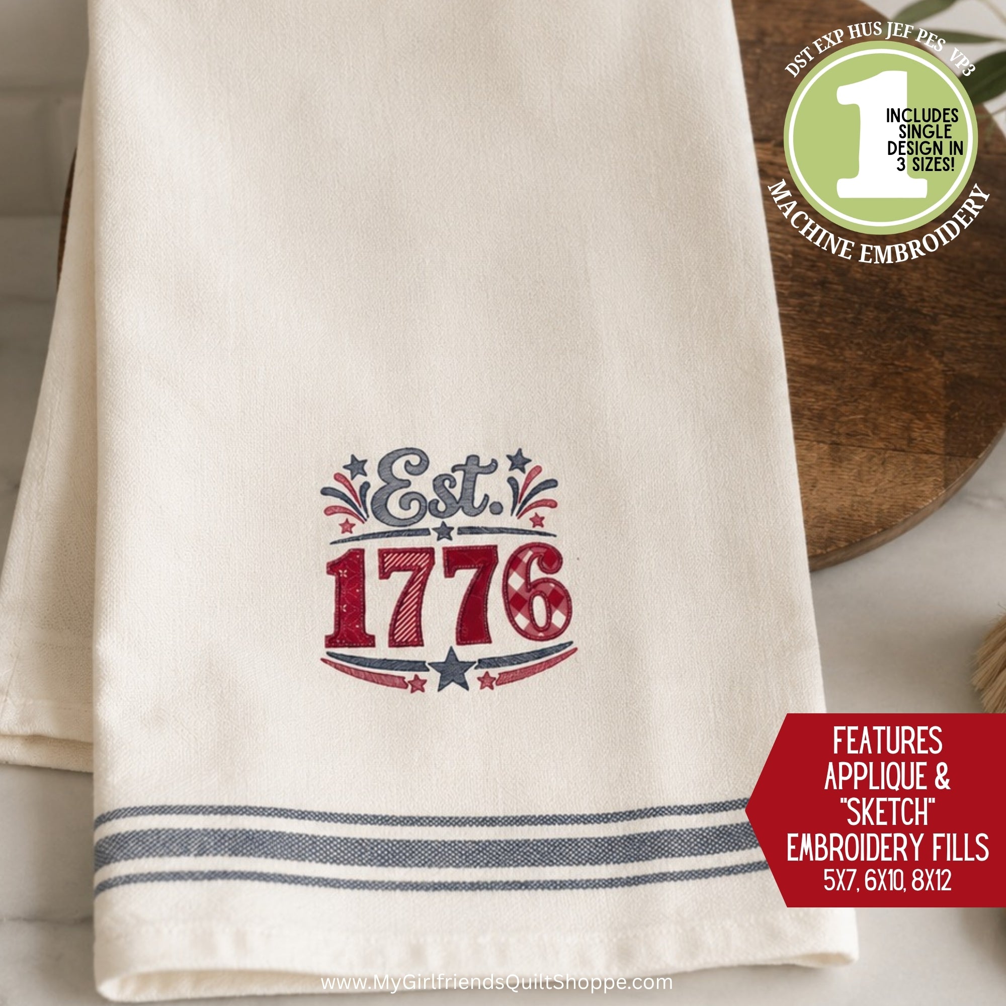 Towel with 'Est. 1776' embroidery design on a wooden surface