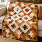 An autumn-themed patchwork quilt draped over a light beige sofa in a cozy living room setting. The quilt features a geometric diamond pattern with star and leaf motifs in warm fall colors including orange, brown, green, and white.