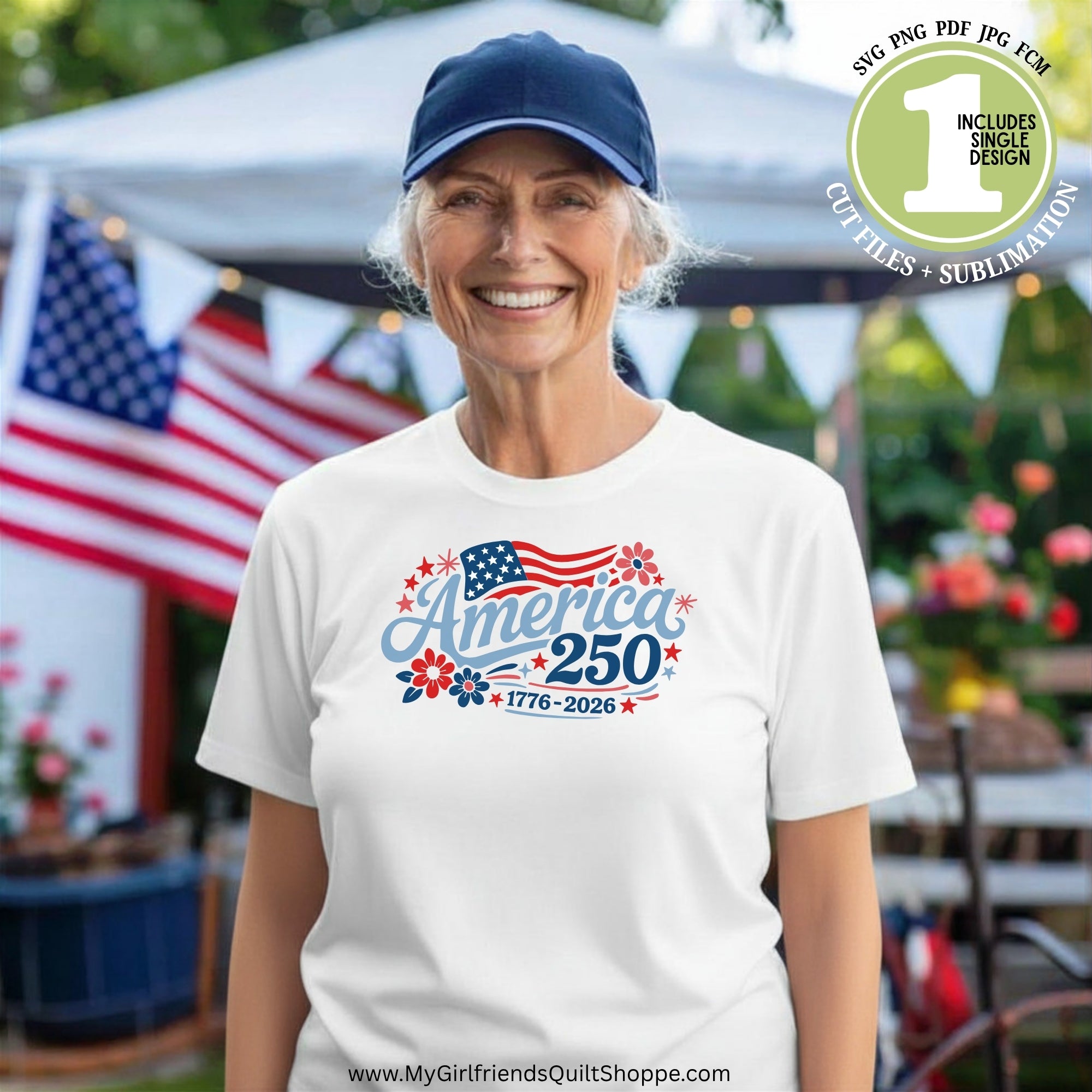 Woman wearing a white t-shirt with 'America 250' design, standing outdoors with flags in the background.