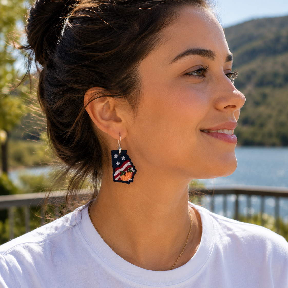 Woman wearing a white shirt with scenic background