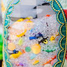 Colorful buttons and beads in a decorative frame