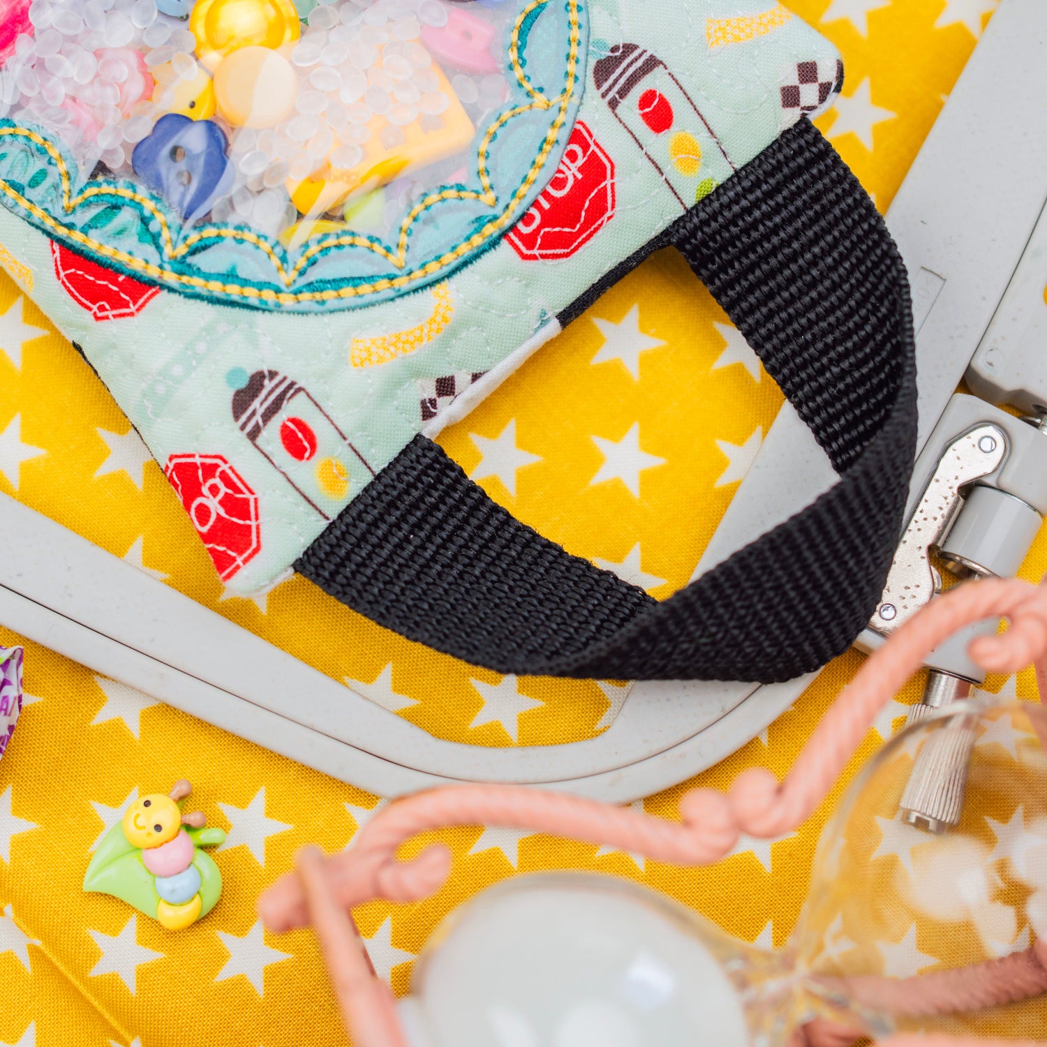 Colorful bag with embroidery on a yellow background