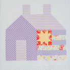 Patchwork house design on a floral background