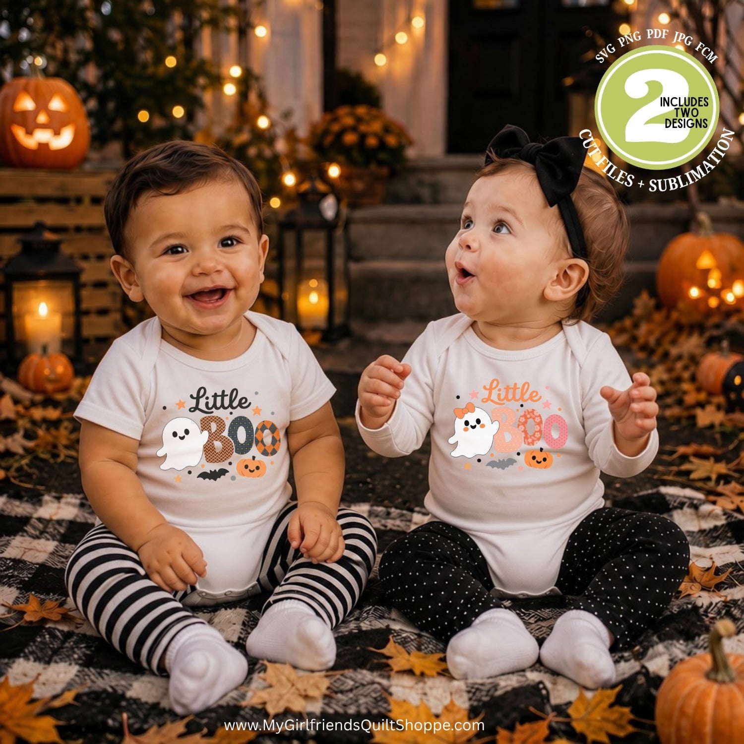 Two babies sitting on a plaid blanket outdoors in a Halloween setting, wearing matching white bodysuits with 'Little BOO' graphics. One baby wears black-and-white striped leggings and the other wears black polka-dot leggings.