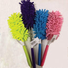 Four colorful duster brushes with labels on a white background