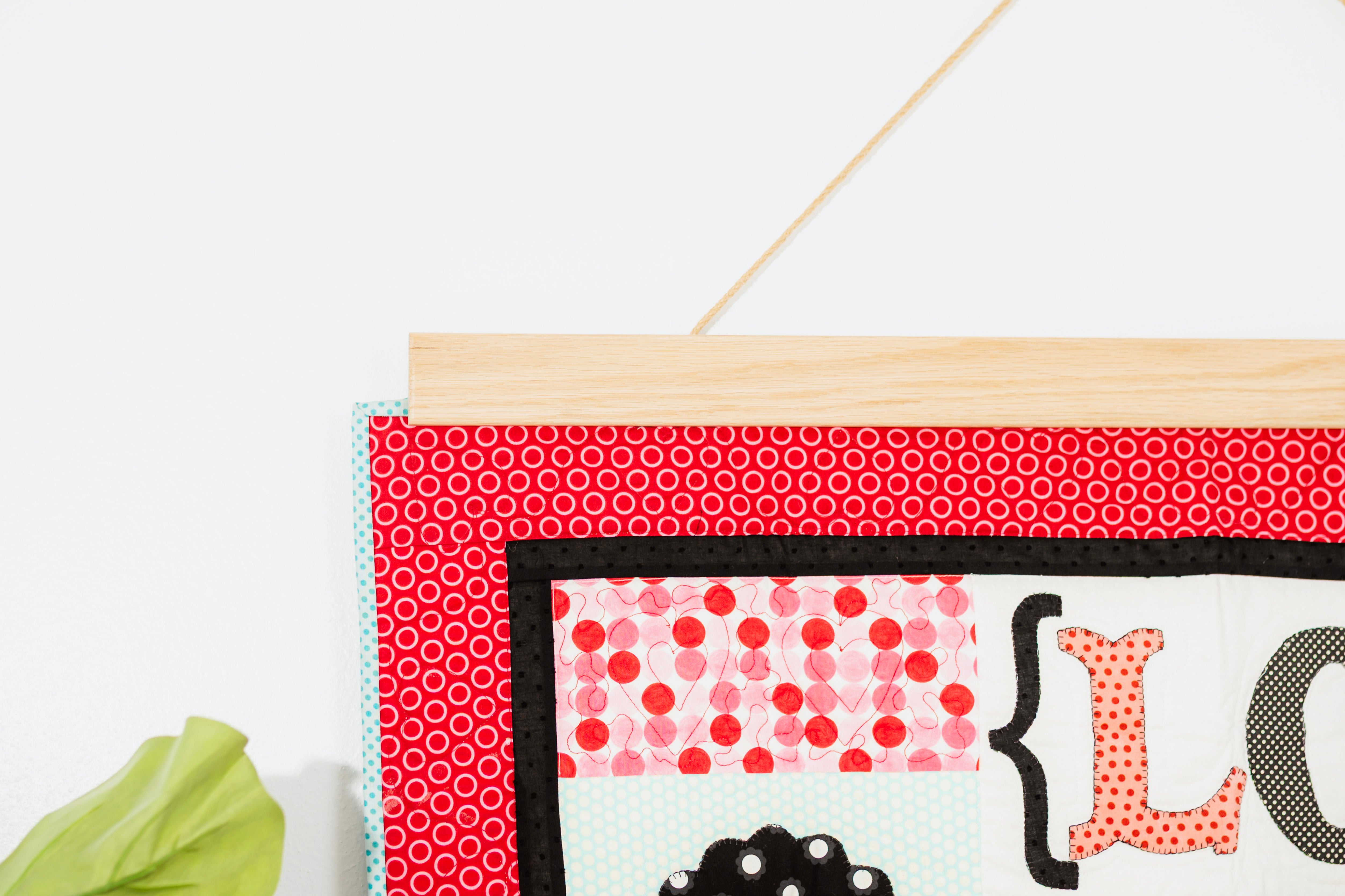 Decorative wall hanging with text and patterns on a white background 36" wall hanger