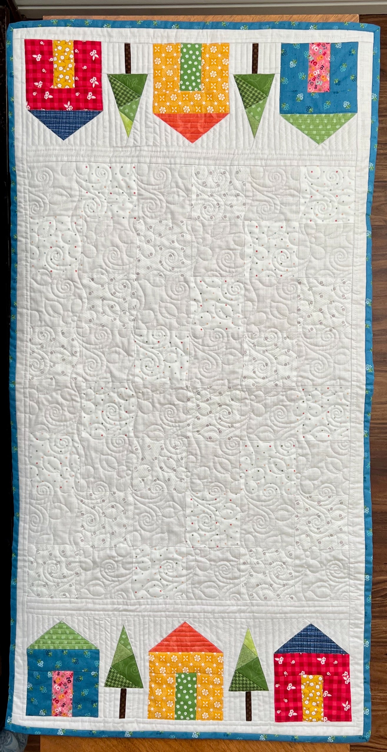 Full table runner with trees and homes from a downloadable pattern