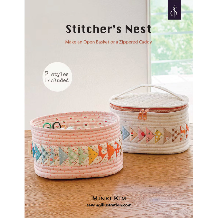 Book cover for 'Stitcher's Nest' by Minki Kim, showing two round quilted fabric caddies on a wooden table in front of a window. The cover includes the subtitle 'Make an Open Basket or a Zippered Caddy' and a badge reading '2 styles included'.