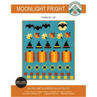 A quilting pattern cover for 'Moonlight Fright' by Lisa Lund for Shadow Valley Quilts, featuring a colorful geometric design of bats, pumpkins, leaves, and witch hats on a teal background.