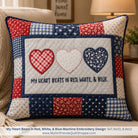 Decorative pillow with heart designs and text on a couch