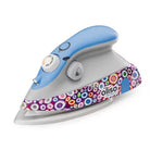 Colorful iron with a patterned handle on a white background