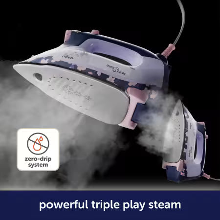 Steam iron with floral design on a black background, featuring a 'zero-drip system' icon.