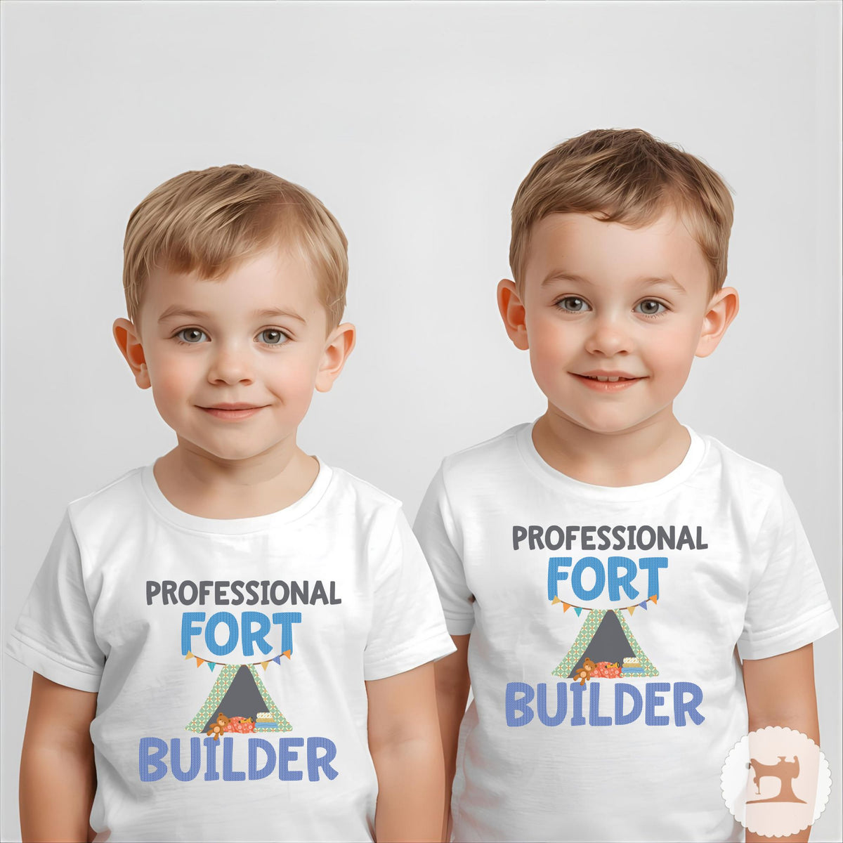 Two children wearing t-shirts with 'Professional Fort Builder' text and graphics on a plain background.