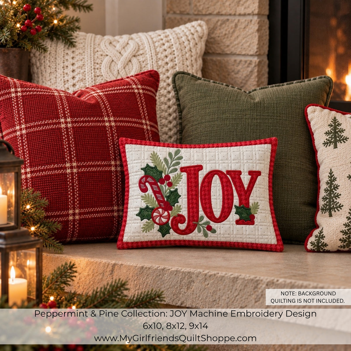 A festive Christmas-themed machine embroidery design preview featuring the word 'JOY' in red with holly and pine branches on a white background, surrounded by decorative throw pillows in a cozy fireplace setting. Text at the bottom specifies dimensions and notes the background quilting is not included.