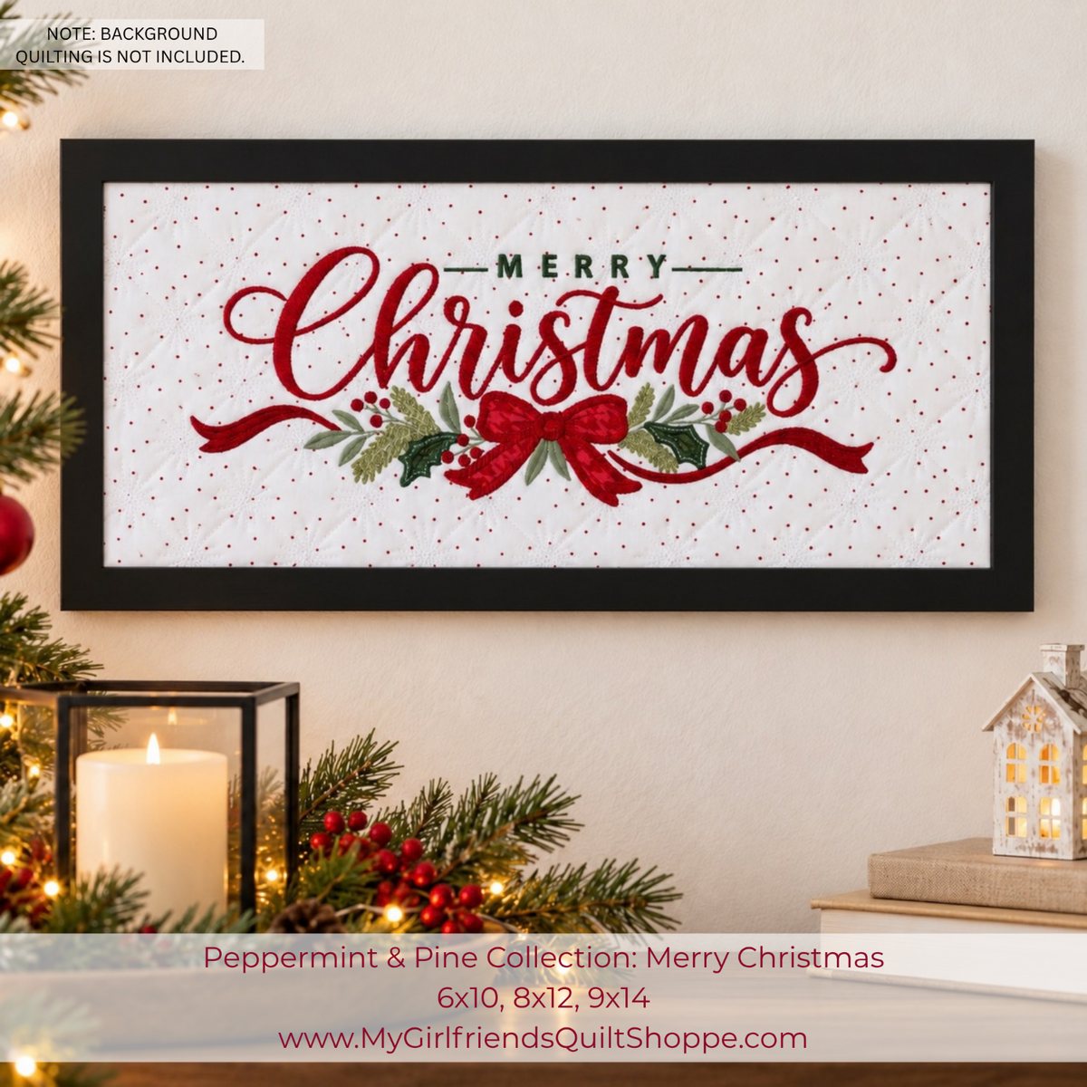 A framed Christmas quilt design featuring the words 'Merry Christmas' in red script over a white dotted background with green pine branches, red berries, and a red bow. The framed print is displayed in a cozy room setting with a lit candle, evergreen branches, and a small house lantern.