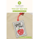 Bag tag with 'Pick Me!' text and red apple design, featuring 'my girlfriend's quilt shoppe' branding.