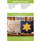 A product information graphic for a Hanukkah quilting pattern, listing materials and a key with photos of two finished embroidered pillows. The left pillow is cream with a gold menorah and 'Happy Hanukkah' text, and the right pillow is navy with a gold Star of David.