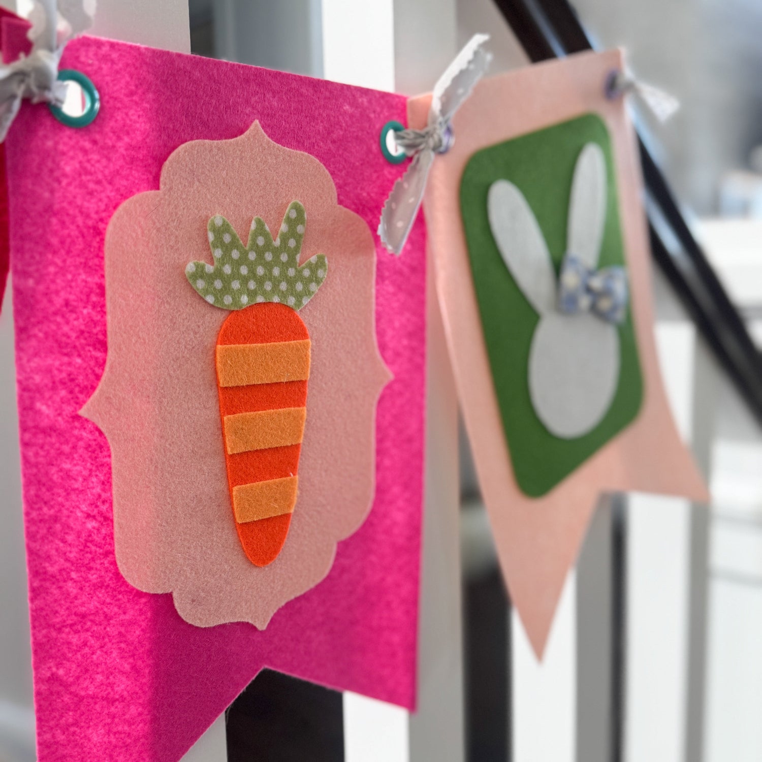Decorative banner with a carrot and bunny design on a pink background.
