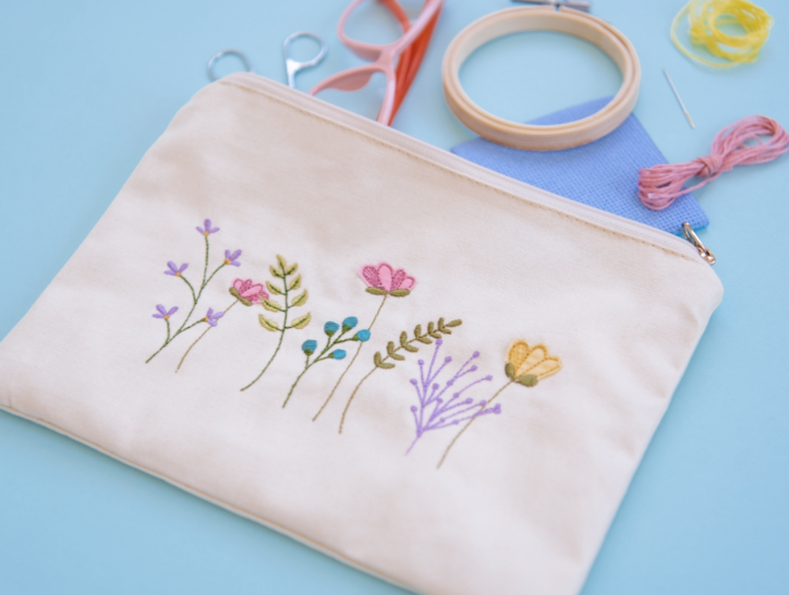 Canvas cream zipper pouch with embroidered flowers 