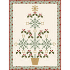 Christmas-themed quilt with geometric patterns and a snowflake design on a white background.