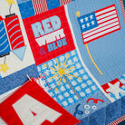Quilt with patriotic designs including stars, flags, and fireworks.