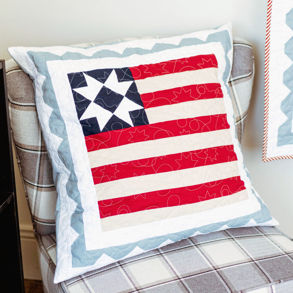 Decorative pillow with American flag pattern on a chair