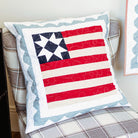 Decorative pillow with American flag pattern on a chair