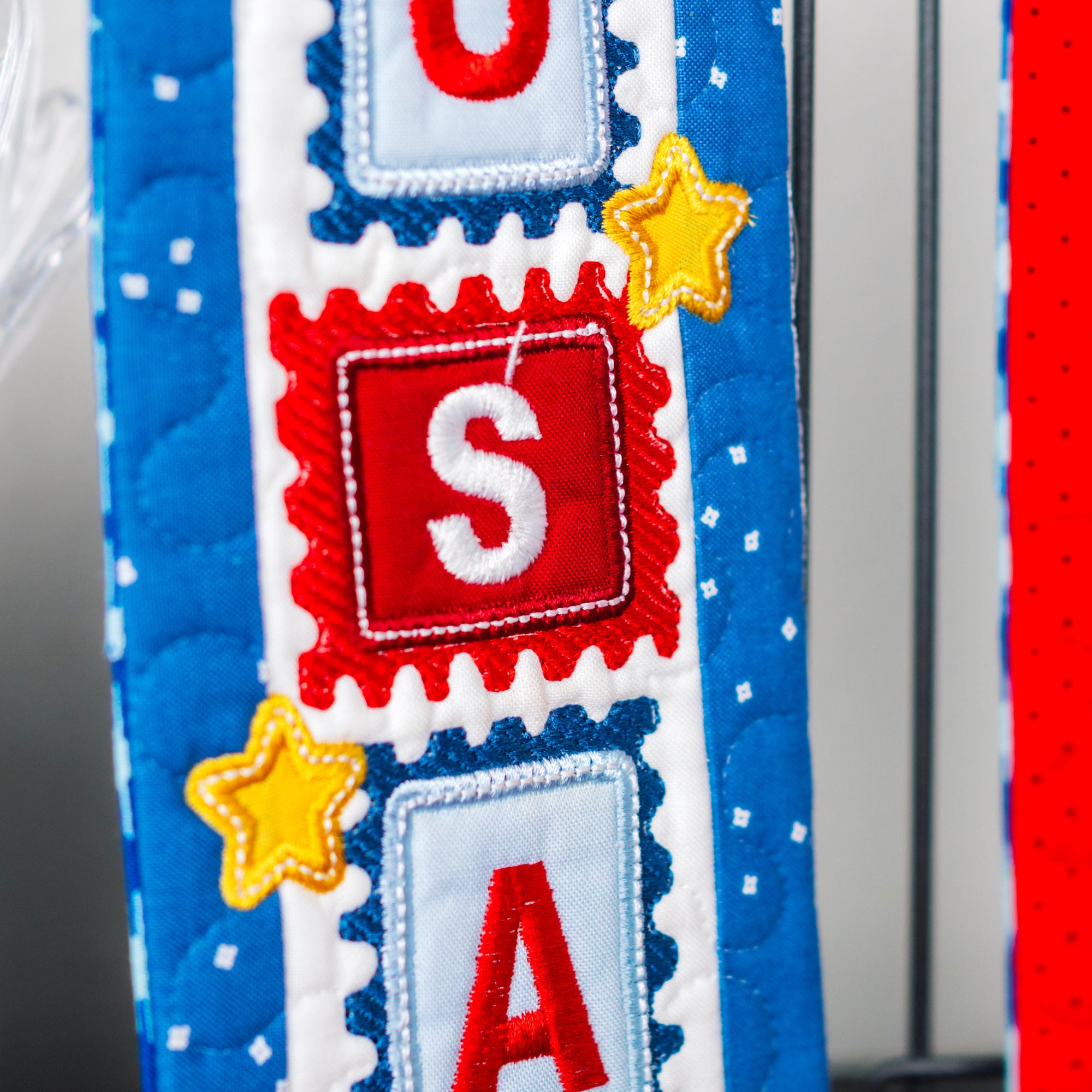Decorative item with 'USA' text on a blue background