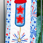 Decorative ribbon with red stars and blue fireworks on a white background