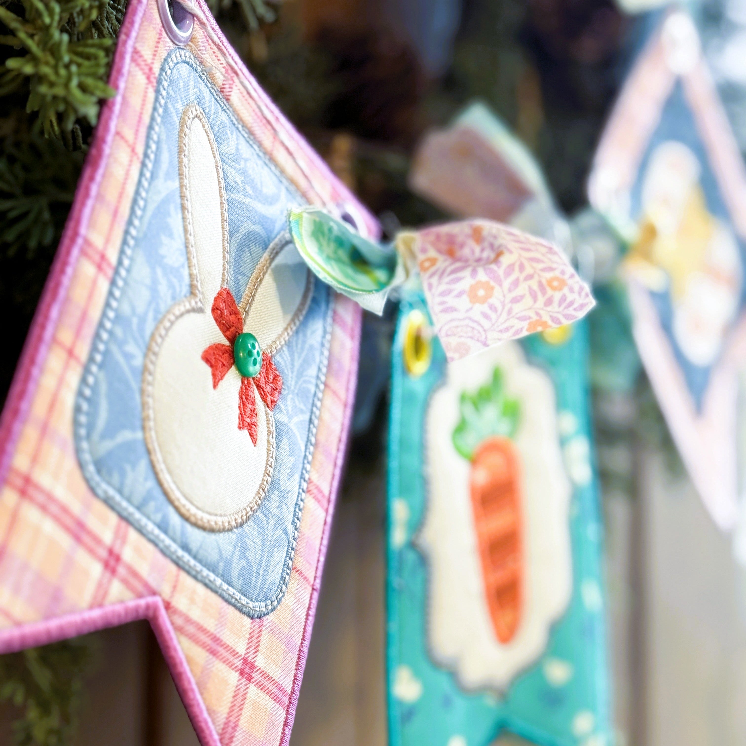 Decorative Easter-themed cards with bunnies and carrots on a blurred natural background